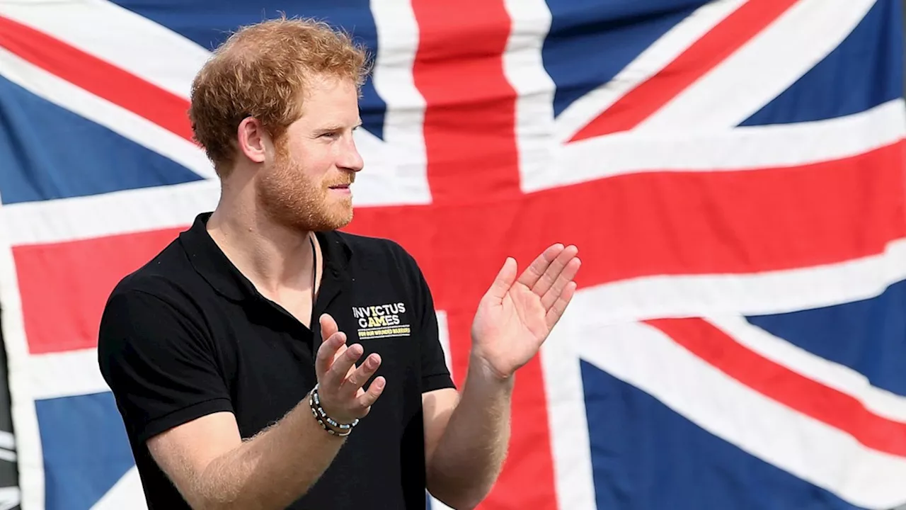 Prince Harry supported by uncle Charles Spencer as royal family attend garden party at Buckingham Palace