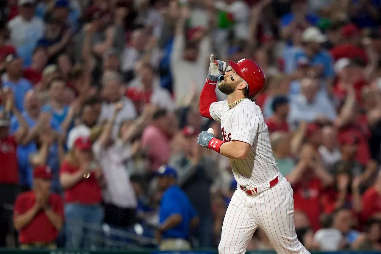 Harper hits grand slam, streaking Phillies rout Blue Jays 10-1