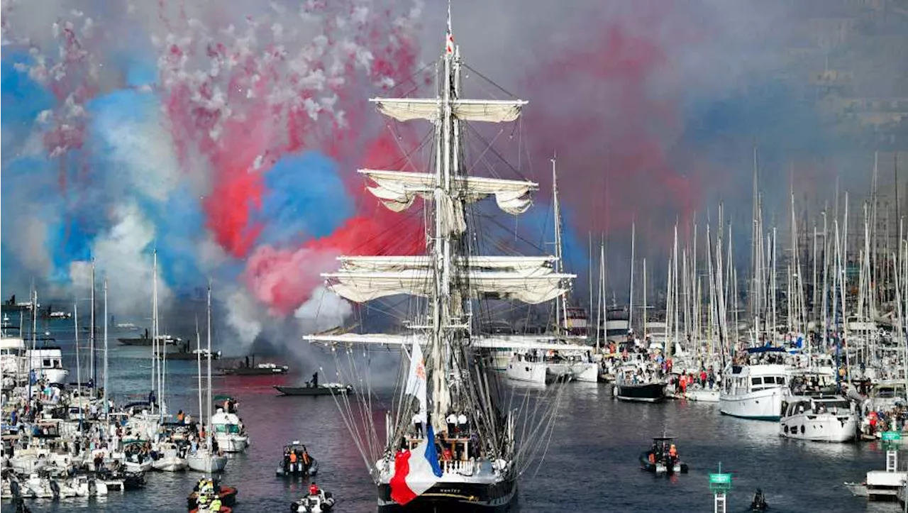 Olympic torch arrives on French soil, launching months of celebrations