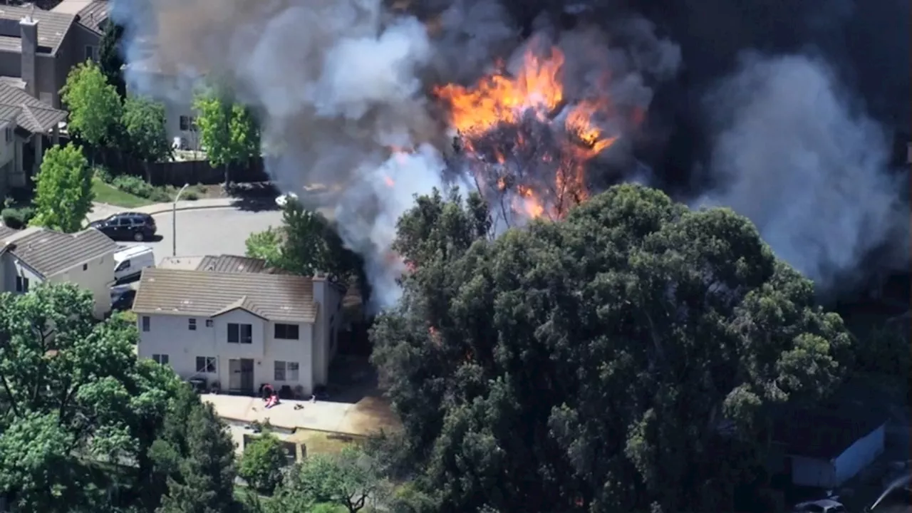 Dramatic video shows Hayward fire threatening homes, now under control