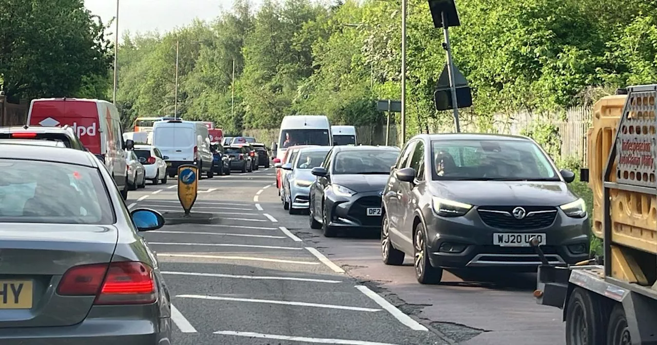 Motorbike and lorry crash on East Lancs Road causing huge delays