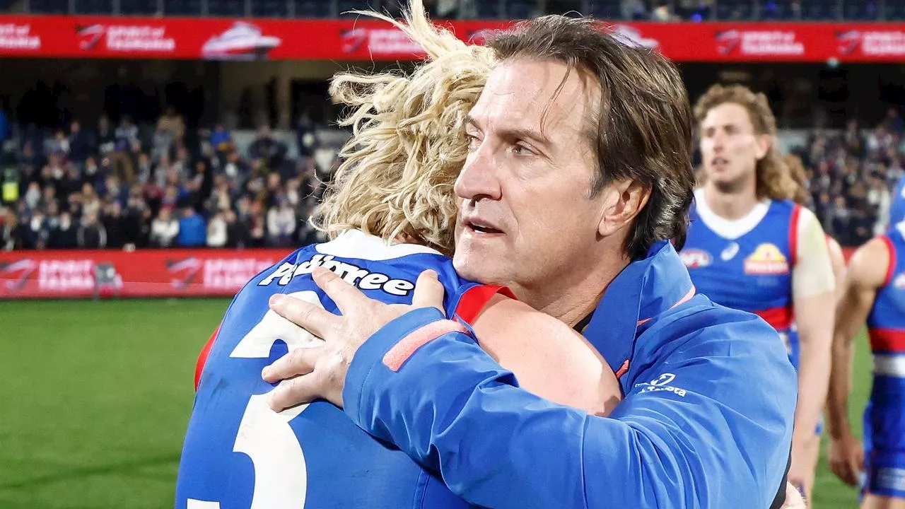 Besieged coach ‘blind’ to fierce criticism as Dogs star’s beautiful act revealed