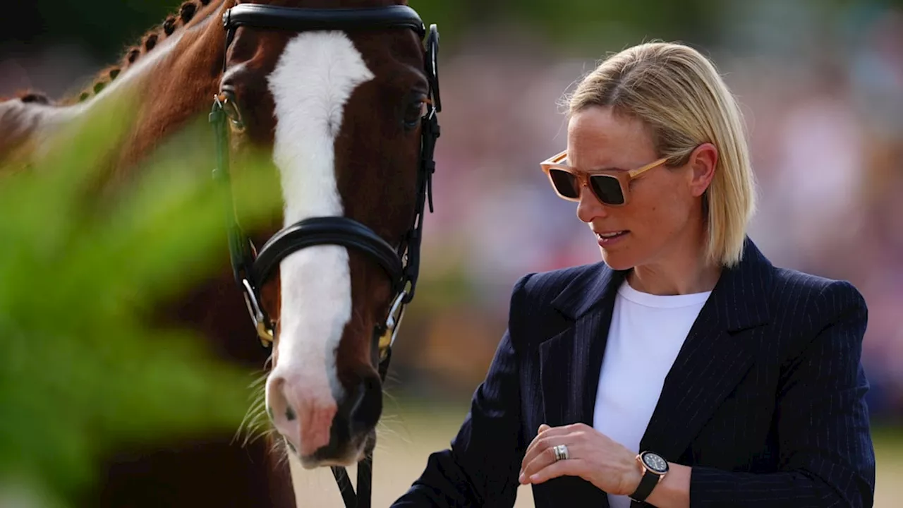 Zara Tindall is a sporty vision in white skinny jeans and trainers