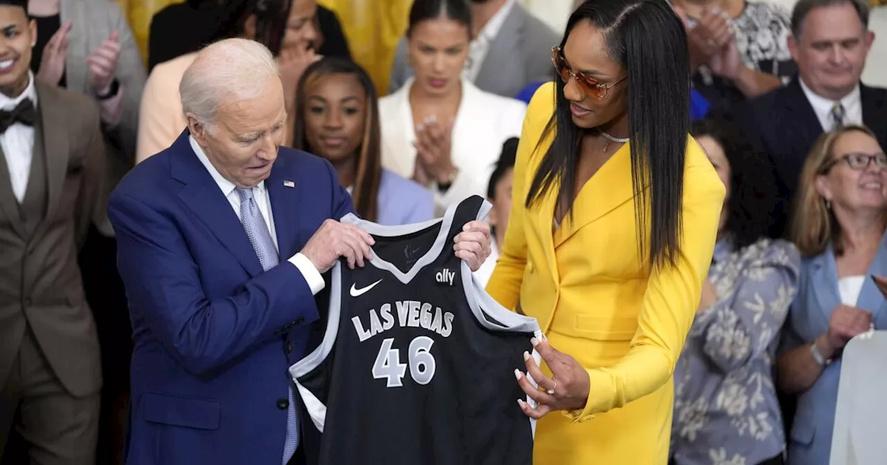 President Joe Biden cheers the Las Vegas Aces and women's basketball