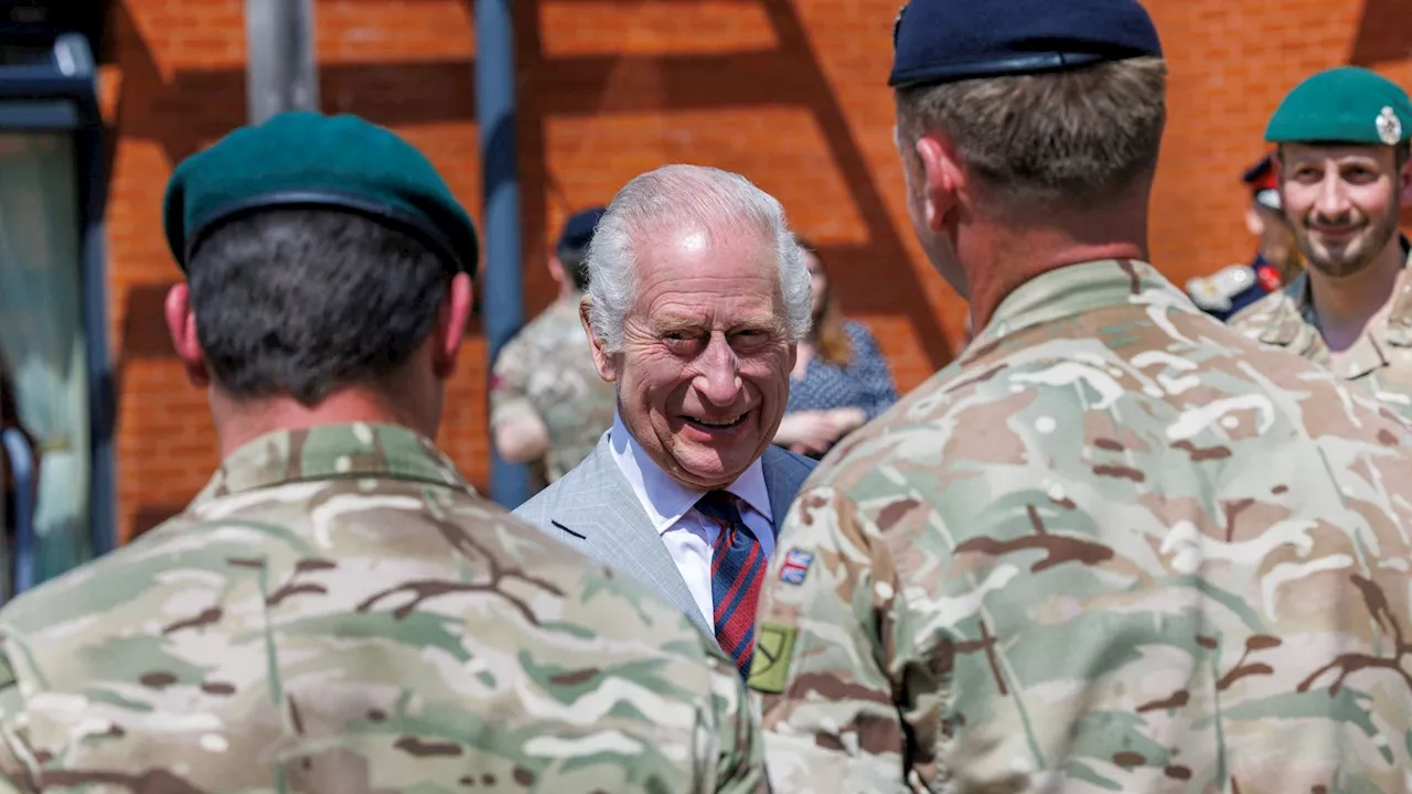 King Charles jokes about being 'allowed out of my cage' during Surrey army barracks visit