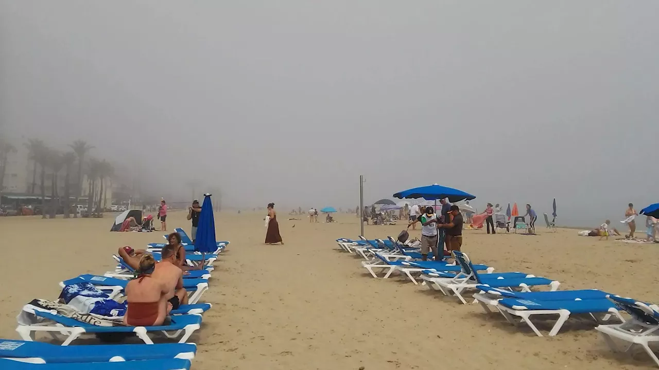 Watch moment Benidorm is shrouded in thick FOG forcing baffled Brit tourists to flee beach