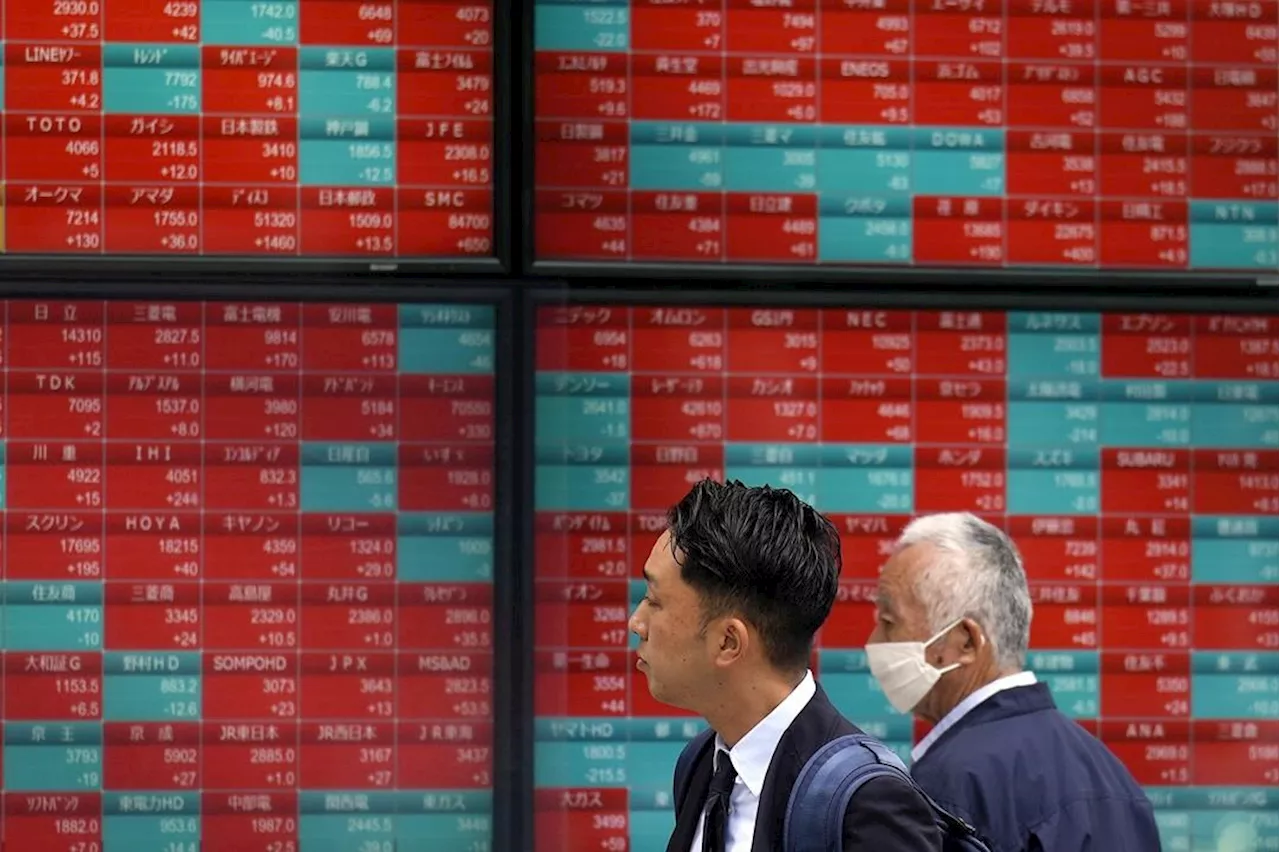 Stock market today: Asian shares mixed after Wall Street's lull stretches to a 2nd day