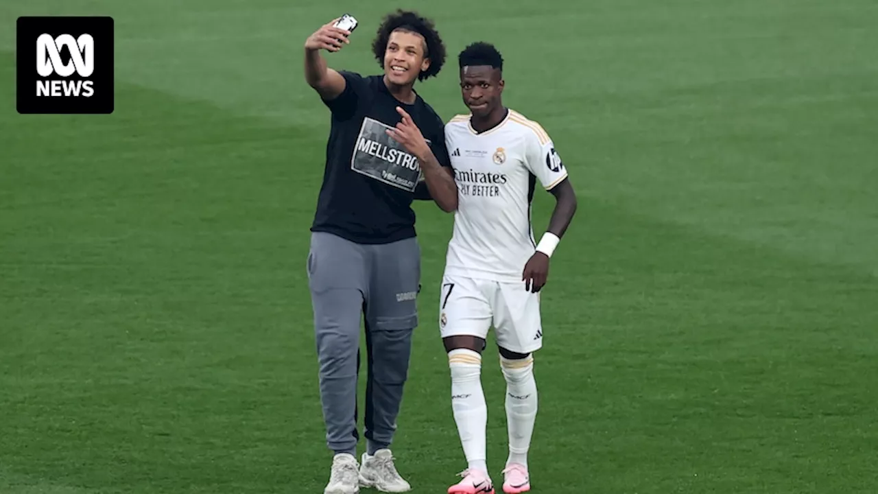 Pitch invaders wearing 'Mellstroy' shirts delay Champions League final before Real Madrid claims victory