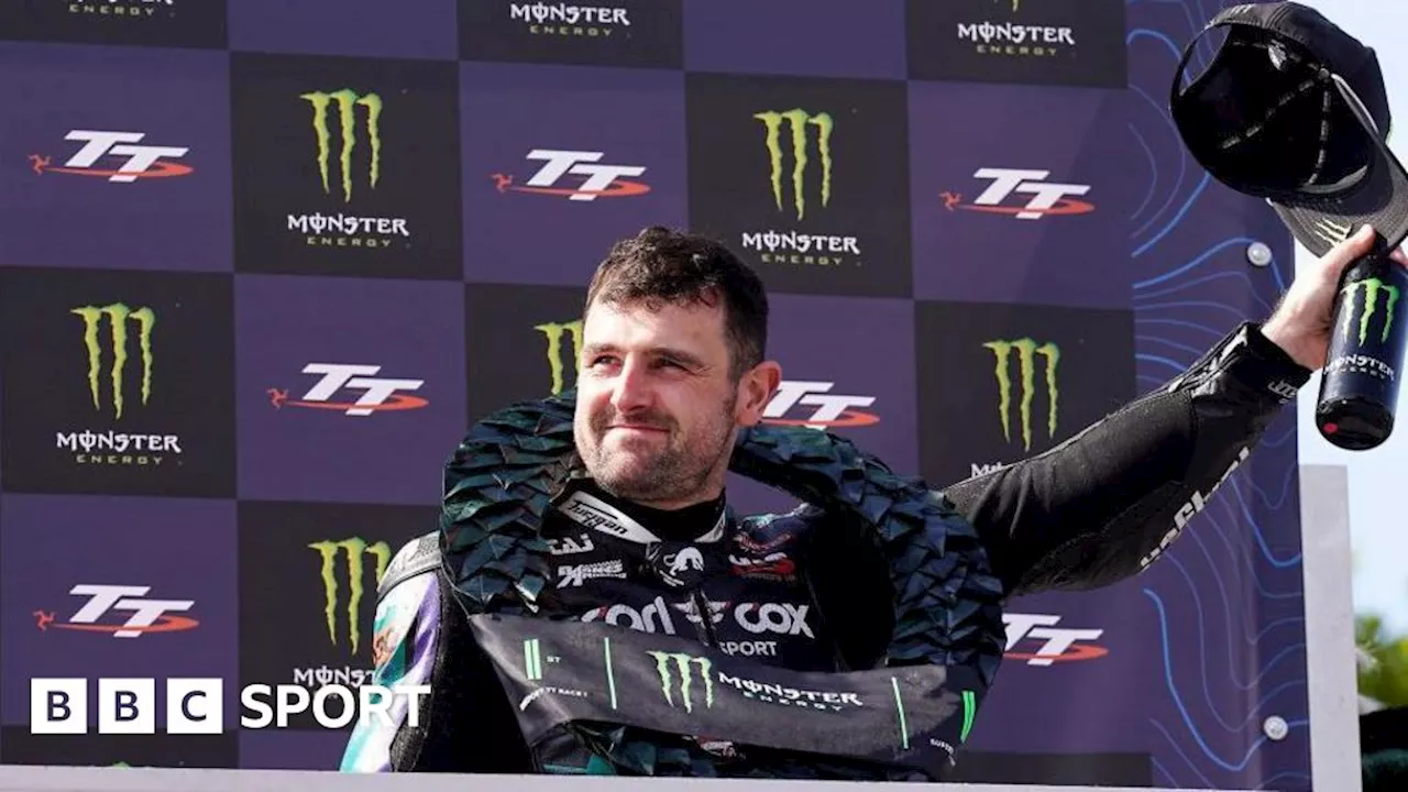 Isle of Man TT: 'An honour to share record with Joey', says Michael Dunlop