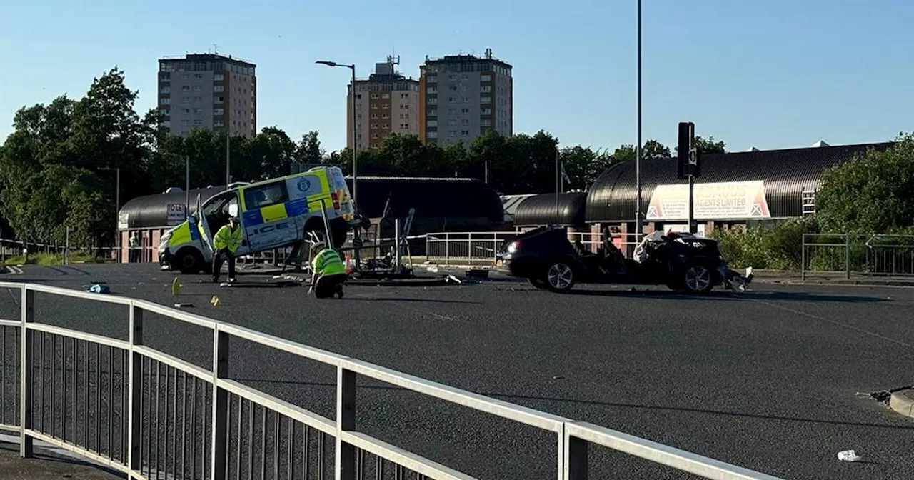 Police van sent 'flying metres in air' after crash with sports car in Glasgow