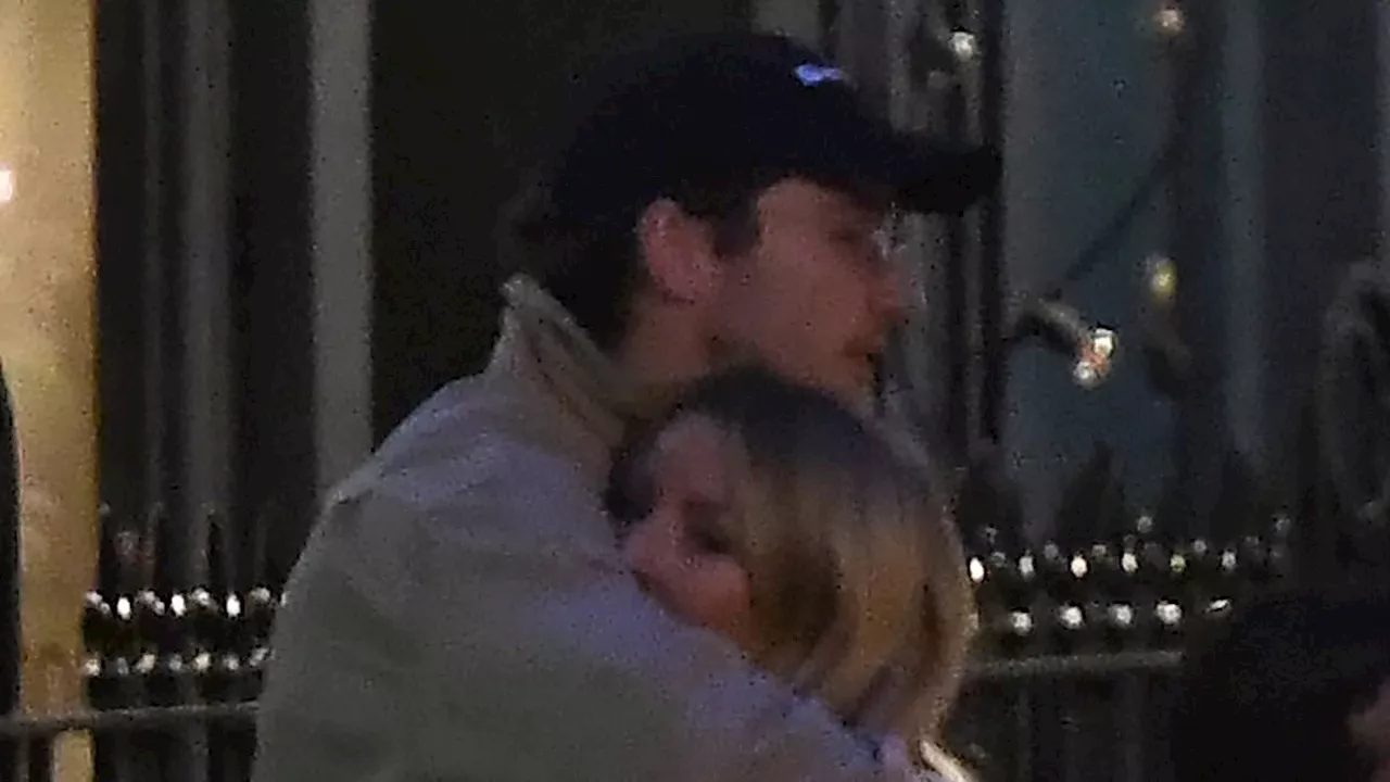 Ellie Goulding is back in Caspar Jopling's arms! Singer is pictured in a tight embrace with her...