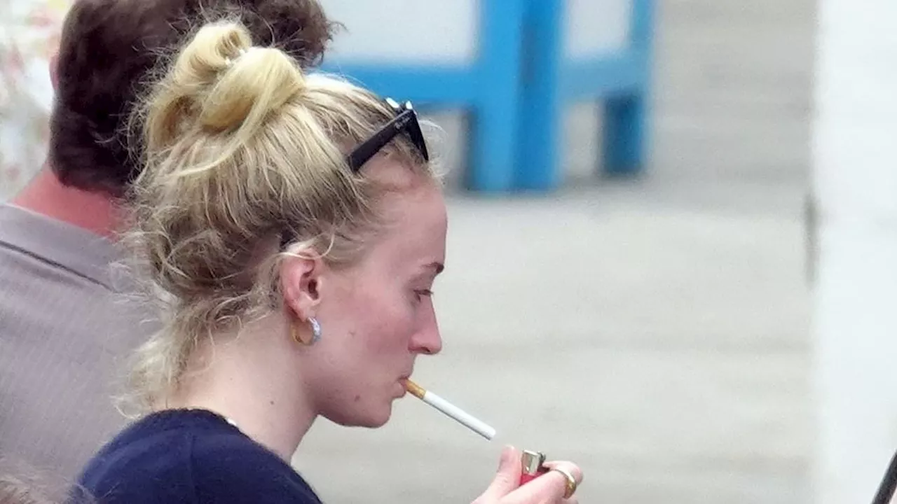 Sophie Turner flaunts gold ring on THAT finger as she hints at engagement to boyfriend Peregrine...