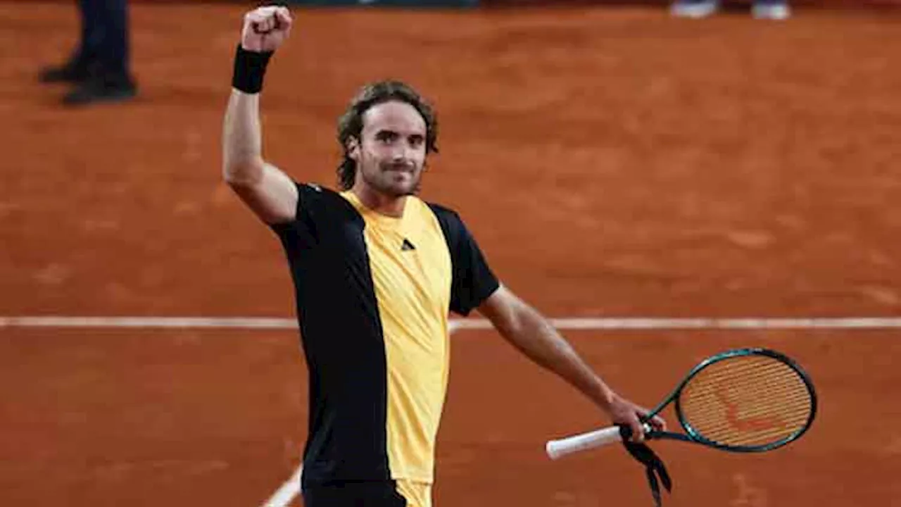 Tsitsipas glides past Zhang into French Open fourth round