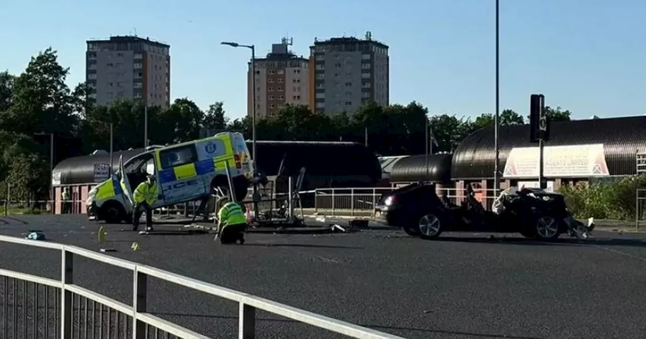 Horror Glasgow crash sends police van 'flying metres in air' as sports car left roofless