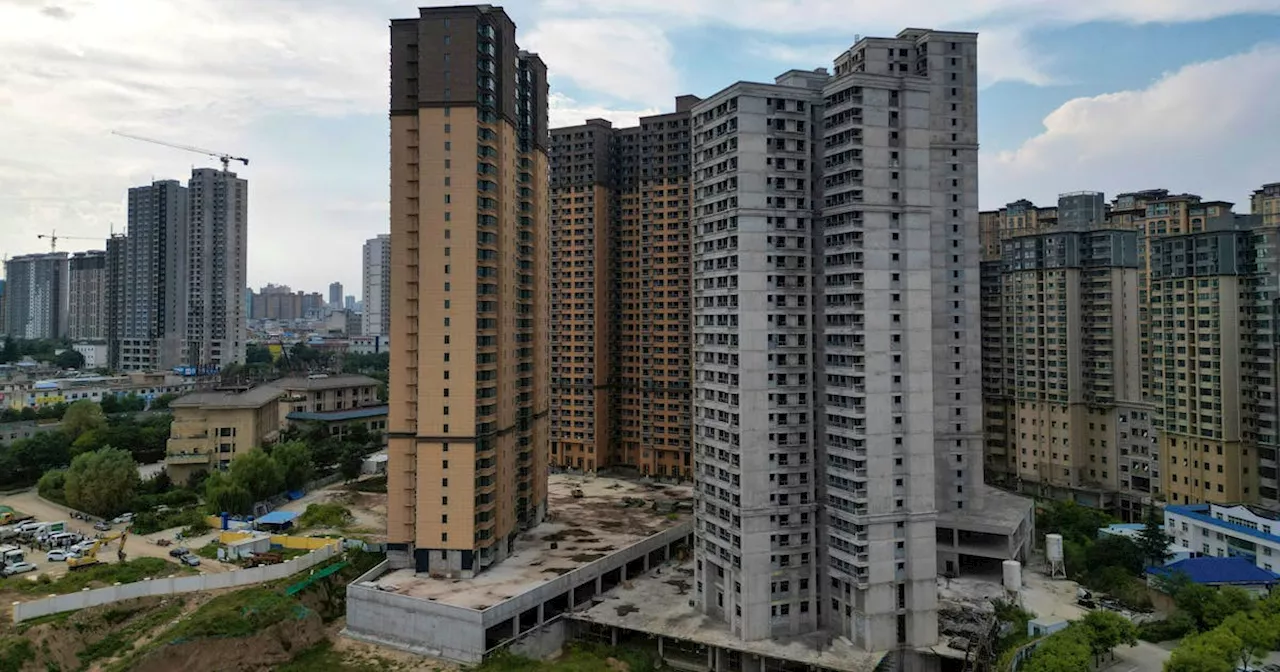 China's new home prices inch up for 9th month in May, survey shows