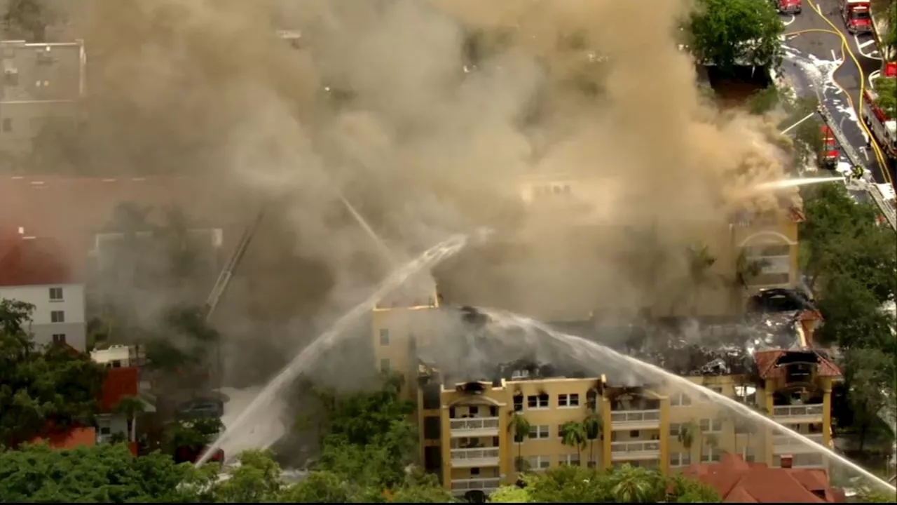 Massive fire breaks out in Miami apartment building; man taken to hospital with gunshot wound