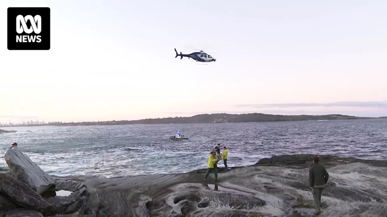 Two women dead after being swept off rocks with a third woman at Kurnell in the Sutherland Shire