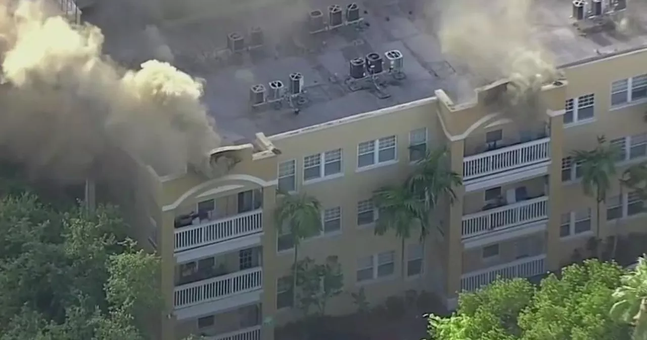 Watch Live: Massive fire at Miami apartment building, person shot found on third floor