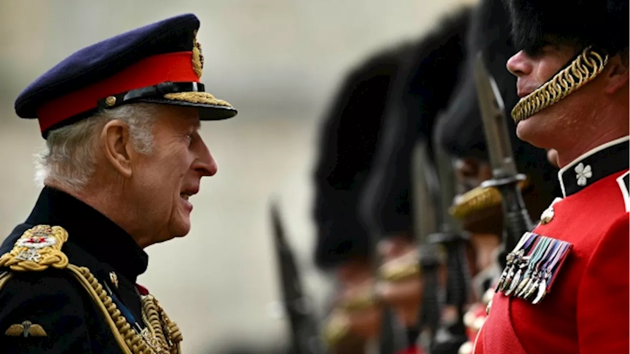 King Charles reviews the Irish Guards