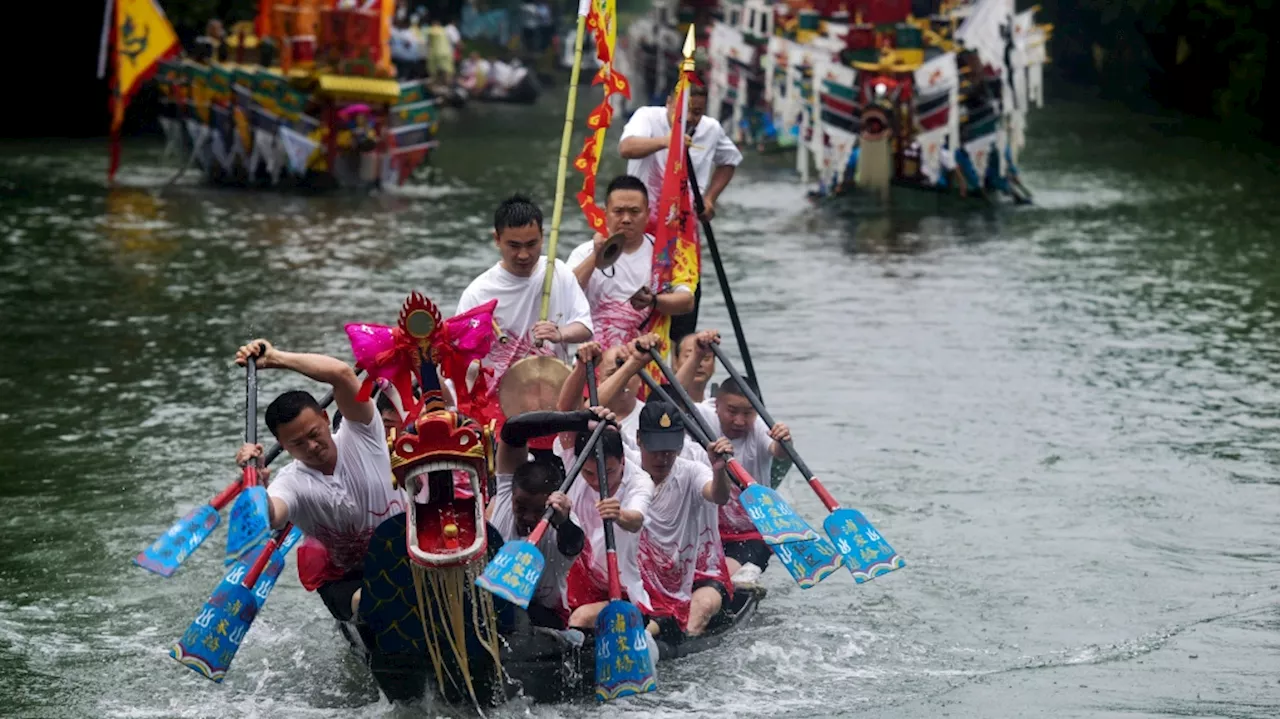 Taiwan nighttime dragon boat racing puts a modern twist on an ancient tradition