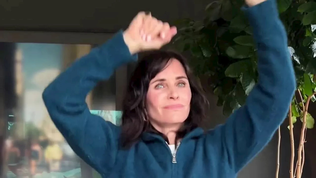 Courteney Cox jumps on the 80s dance trend recreating her iconic dance with Bruce Springsteen in...