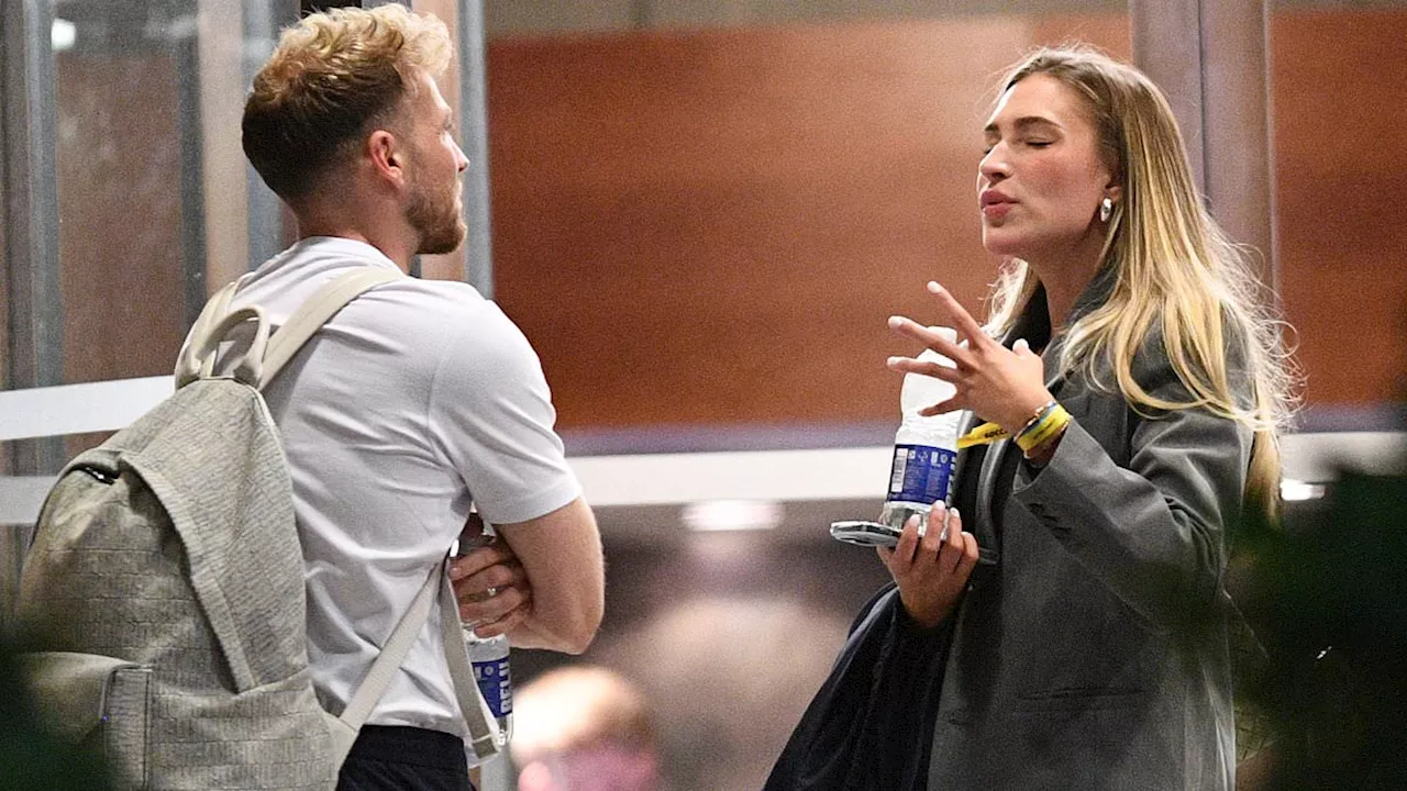 Zara McDermott and boyfriend Sam Thompson are locked in a heated chat as they depart star-studded...