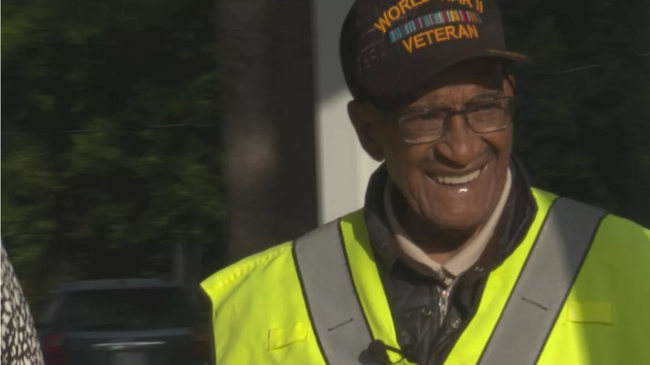 102-year-old crossing guard hangs up his vest for retirement