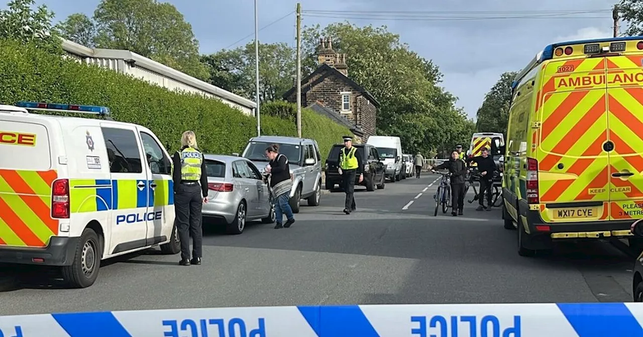 Man dies after armed siege in sleepy Leeds suburb as police storm home