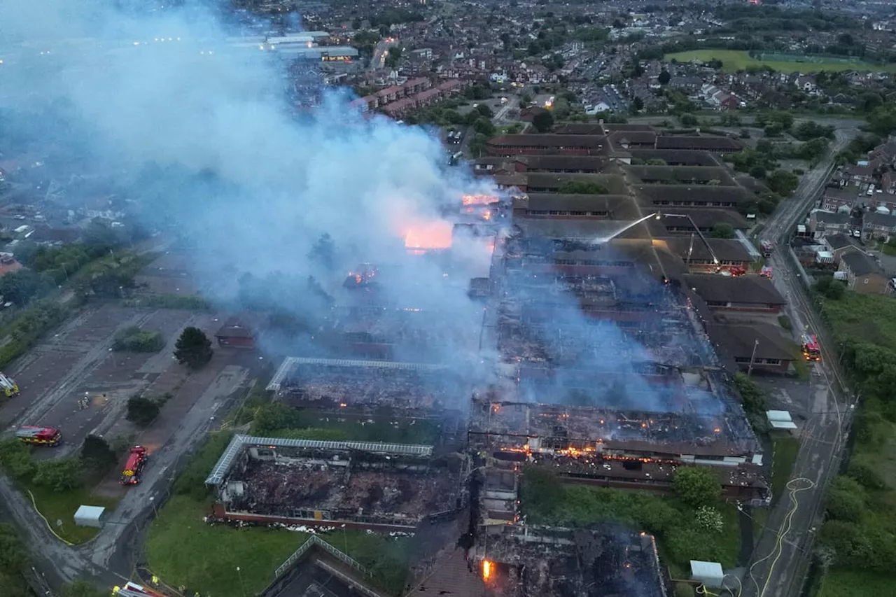 Police and fire service investigate blaze at former government building on Warbreck Hill Road in Blackpool