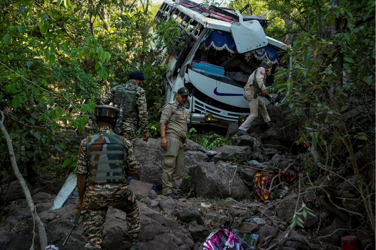 At least 9 dead after suspected militants in Kashmir fire at Hindu pilgrims, sending bus into gorge