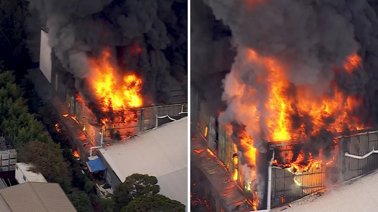 Fire engulfs factory at Revesby near Bankstown Airport in Western Sydney