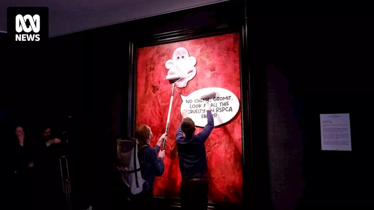 Animal Rising activists paste Wallace and Gromit image over portrait of King Charles at London art gallery