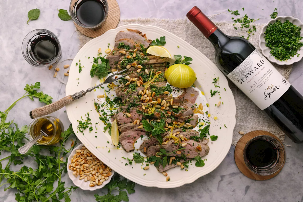 Rare roast lamb served with a glass of Sauvignon