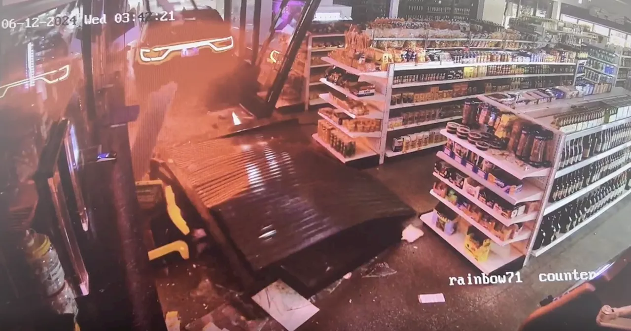 Burglars seen on video using SUV to smash their way into South Side Chicago liquor store