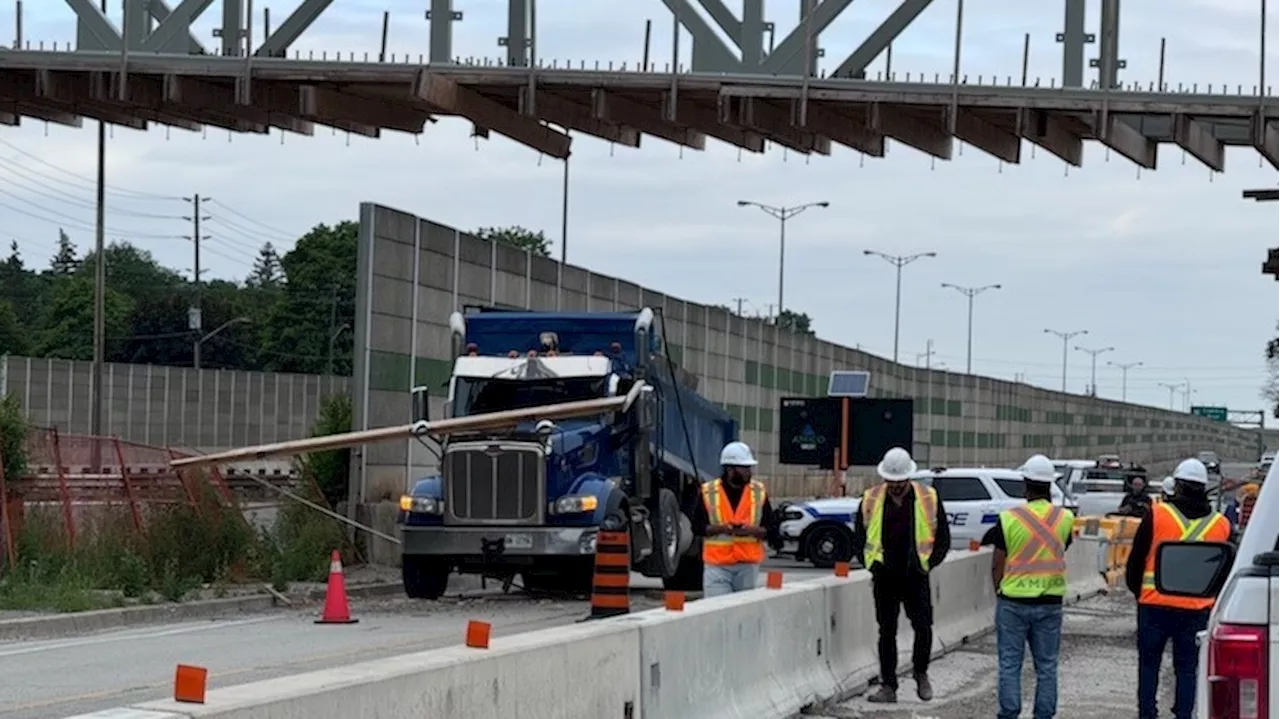 QEW closed in Mississauga after dump truck hits overpass: OPP