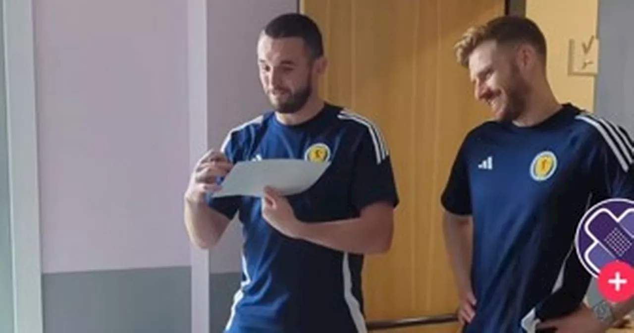 Scotland hero John McGinn entertains children at Glasgow hospital