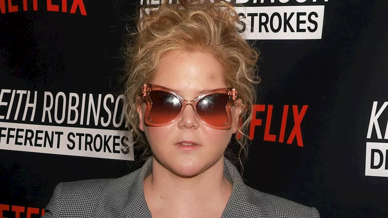 Amy Schumer rocks futuristic shades indoors to the LA screening of Netflix's Different Strokes after...