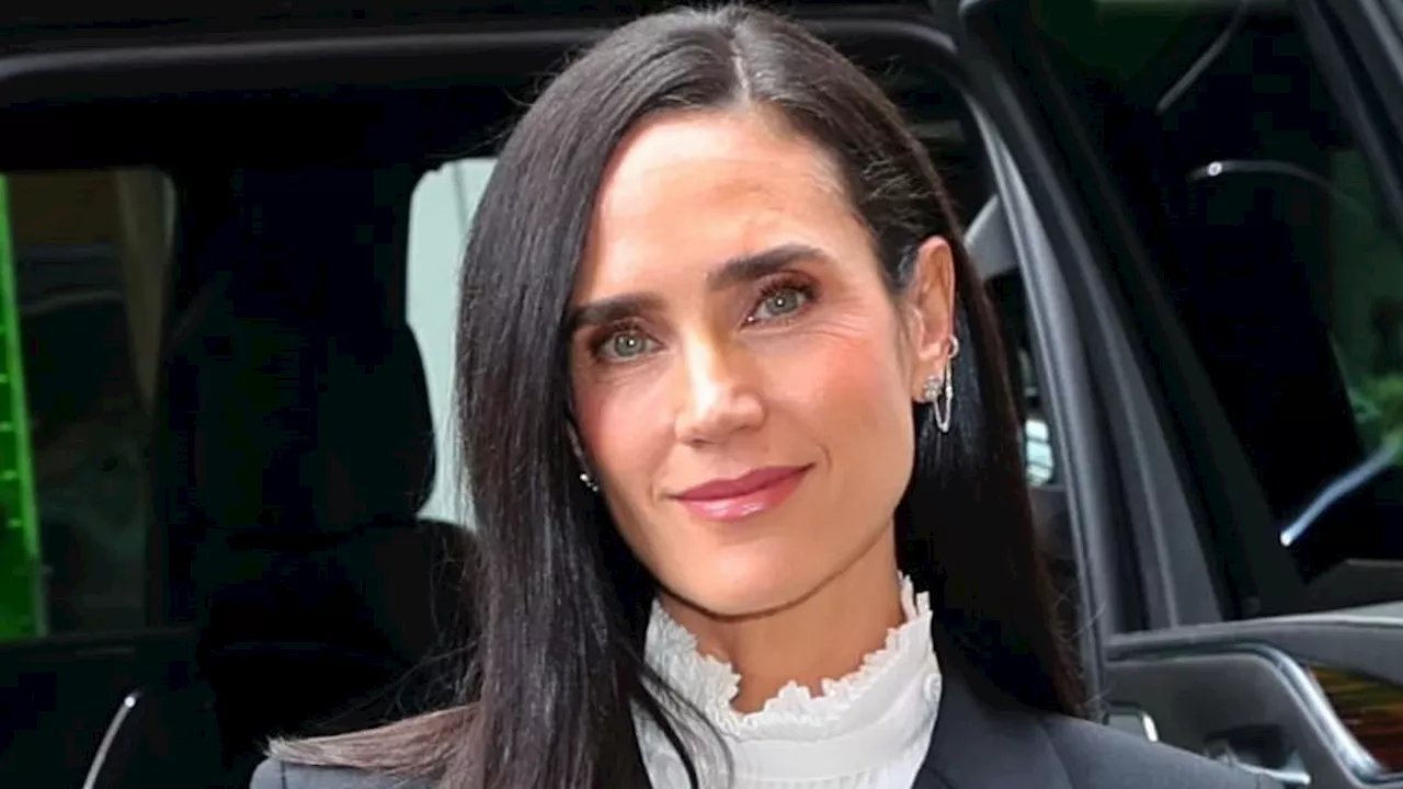 Jennifer Connelly, 53, shows off her slender legs in a black leather miniskirt as she stops by The...