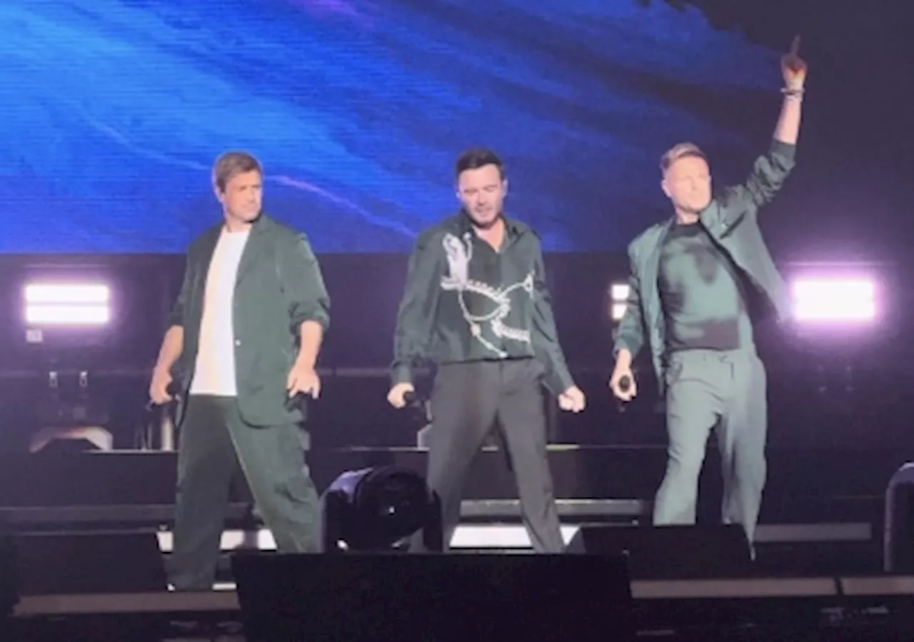 Westlife returns to Malaysia as a trio, thrills local fans with two-hour concert featuring their hits