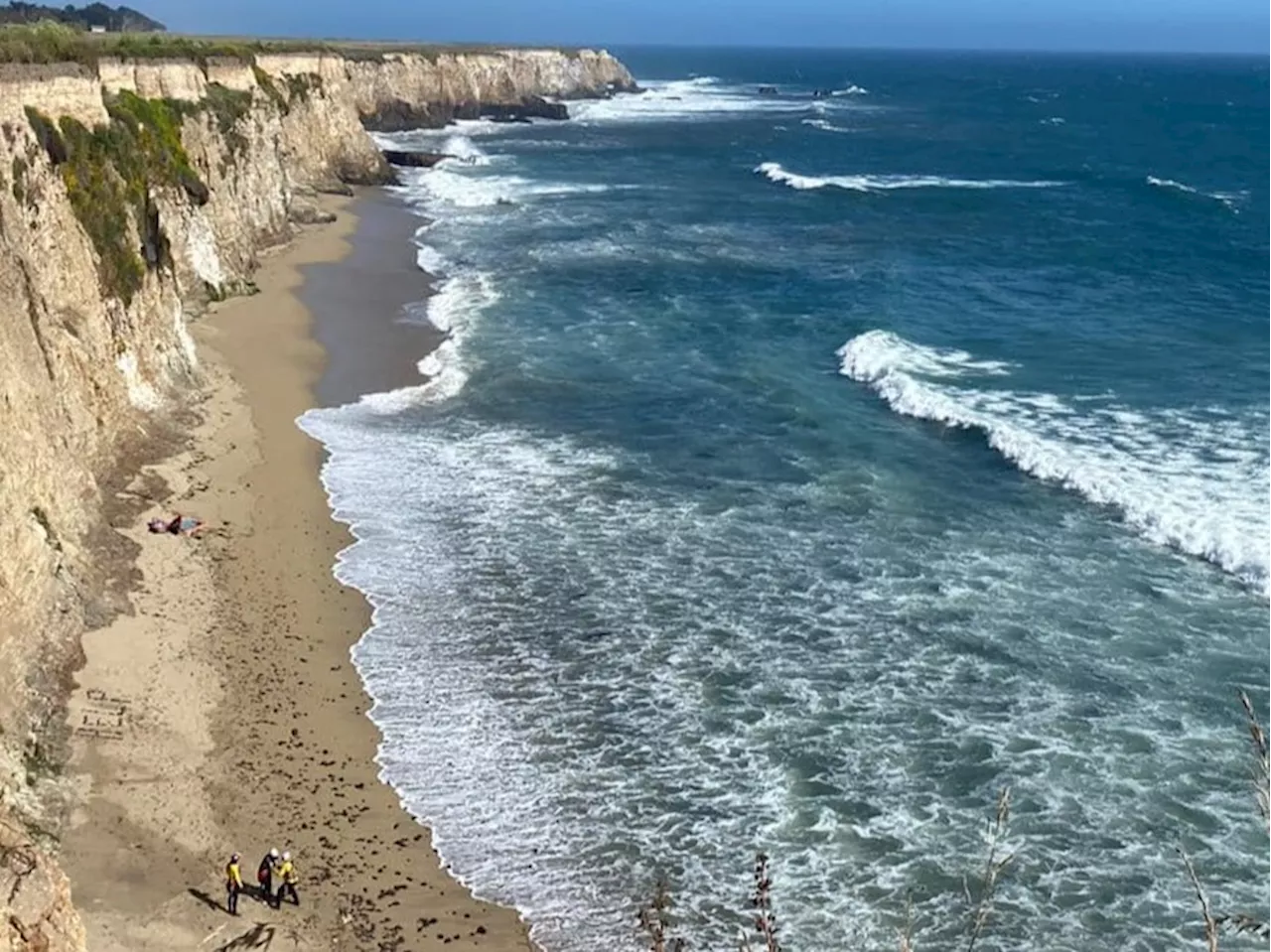 Stranded kitesurfer rescued from secluded Santa Cruz County cove after creating “HELP” sign with rocks