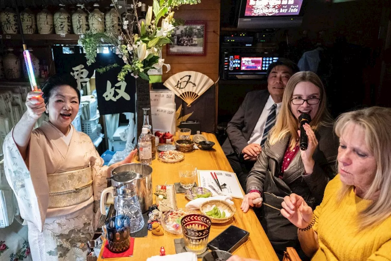 Tourists get taste of old Japan at hidden 'snack bars'