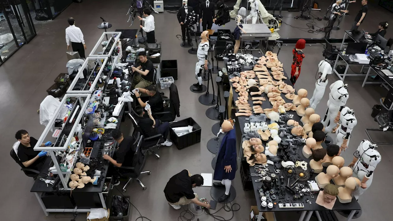 Terrifying vid shows China’s humanoid robot factory with piles of skinned faces & lifelike machines to r...