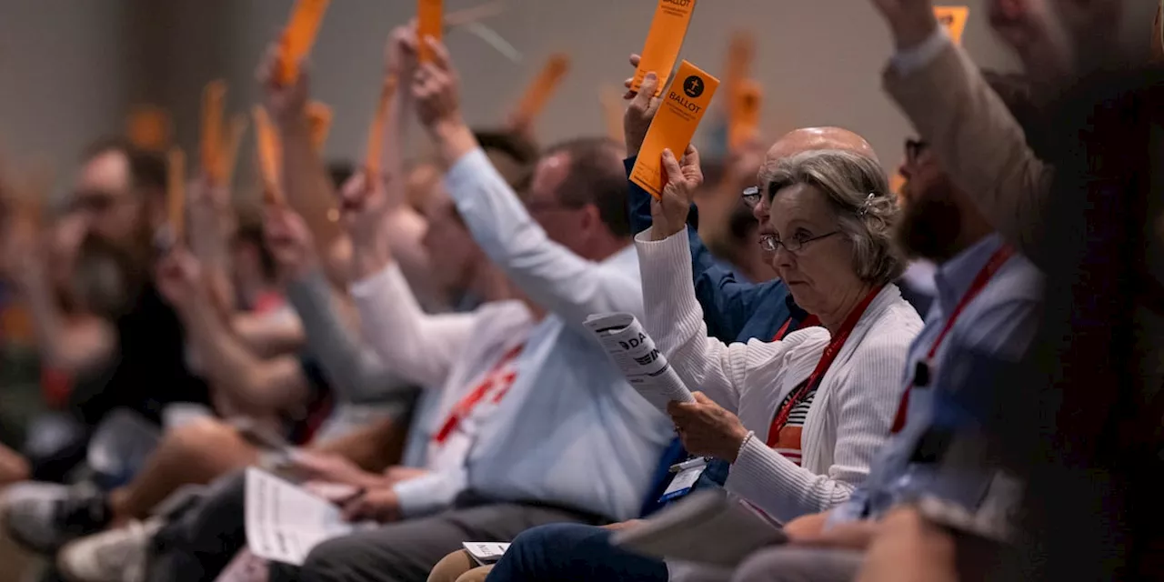 More than 10,000 Southern Baptists gather for meeting that could bar churches with women pastors