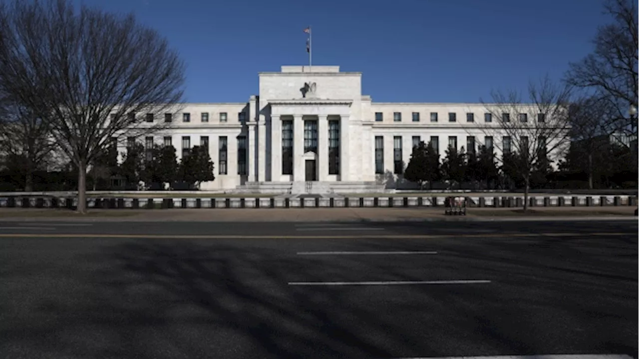 U.S. Fed officials dial back rate forecasts, signal just one '24 cut