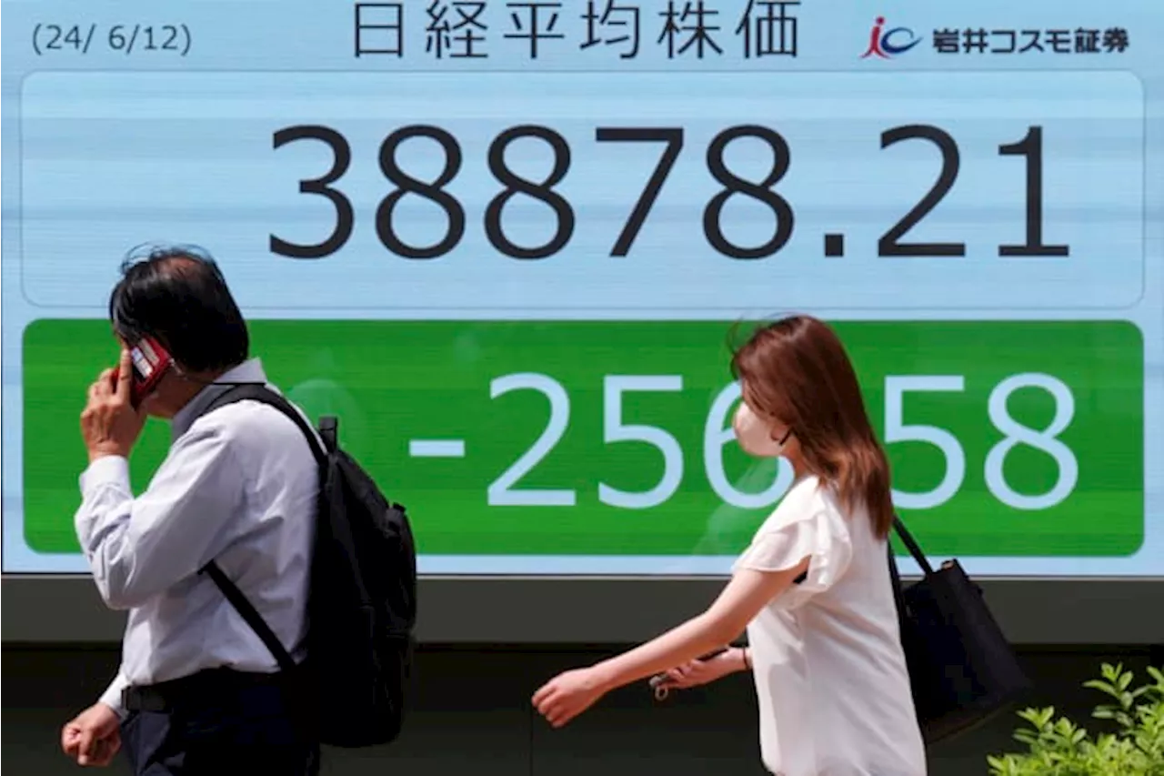 Stock market today: Asian shares are mixed ahead of a Fed decision on interest rates