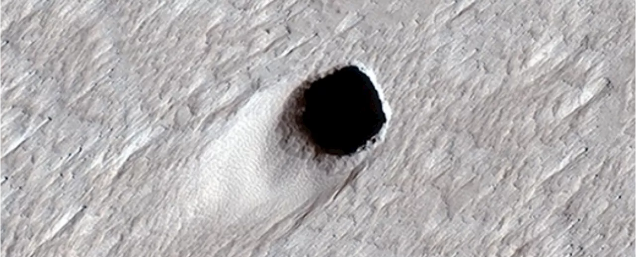 Mysterious Holes on Mars Could Hold Secrets to Extraterrestrial Life