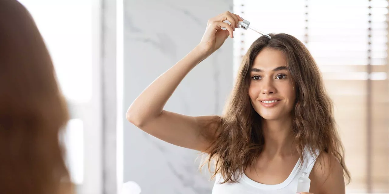 How To Use Rosemary Oil To Grow Thicker, Healthier Hair, According to Experts