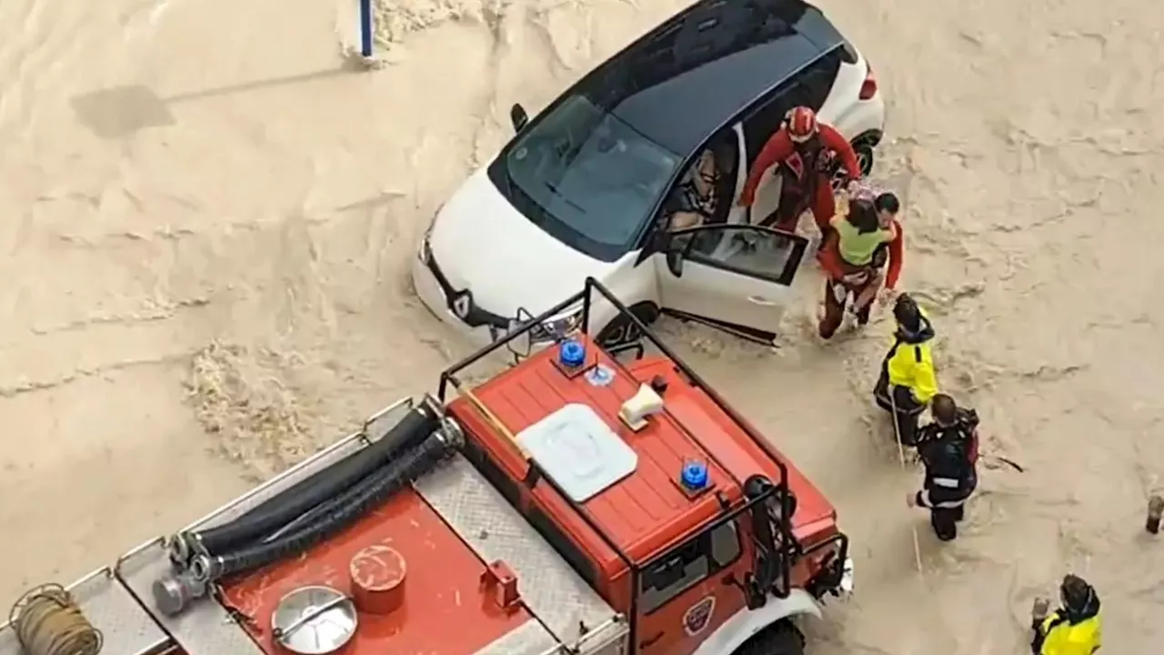 Major rescue operation at holiday hotspot as heavy flooding leaves drivers trapped in cars after Majorca...