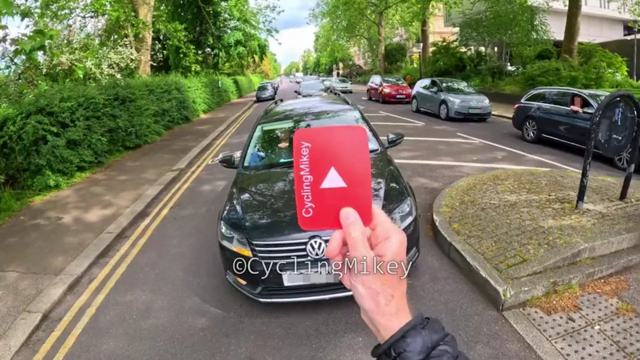 Watch bizarre moment cyclist deliberately stops traffic turning into junction