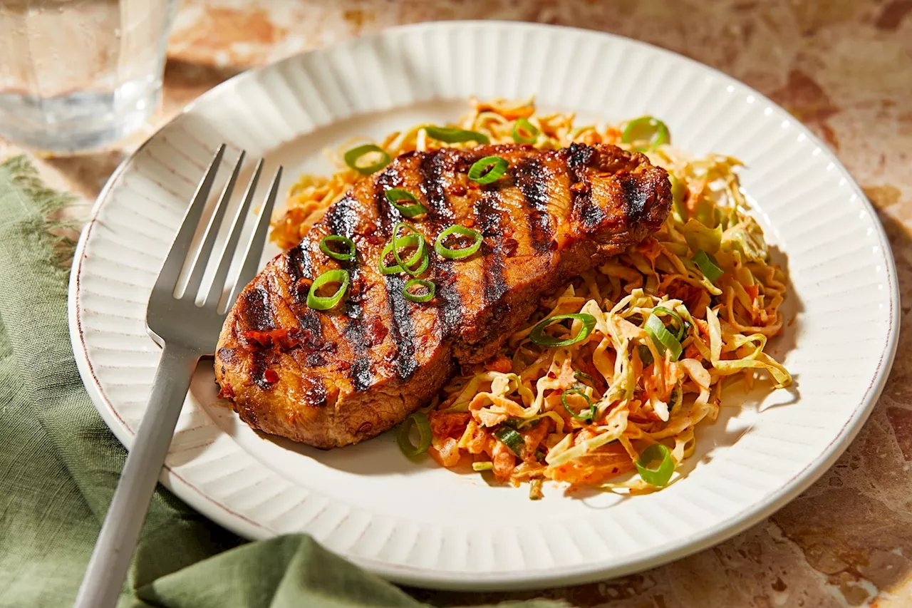 Chili crisp pork chops and kimchi slaw is a bold 30-minute meal